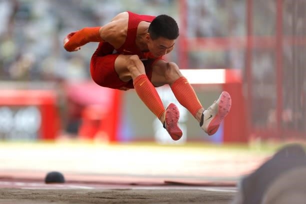 Zhu Yaming of China competes in the Men's Triple Jump Final on day thirteen of the Tokyo 2020 Olympic Games at Olympic Stadium on August 5, 2021 in...
