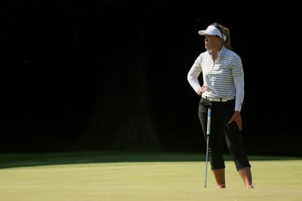 Brooke Henderson of Team Canada stands on the 17th green during the second round of the Women's Individual Stroke Play on day thirteen of the Tokyo...
