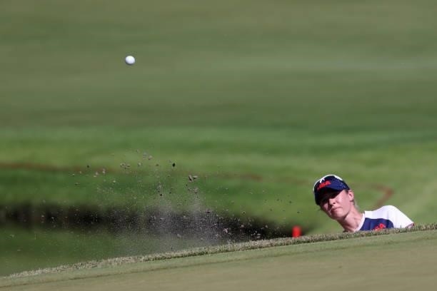 Nelly Korda of Team United States plays a shot from a bunker on the 18th hole during the second round of the Women's Individual Stroke Play on day...