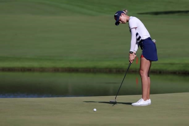 Nelly Korda of Team United States putts on the 18th green during the second round of the Women's Individual Stroke Play on day thirteen of the Tokyo...