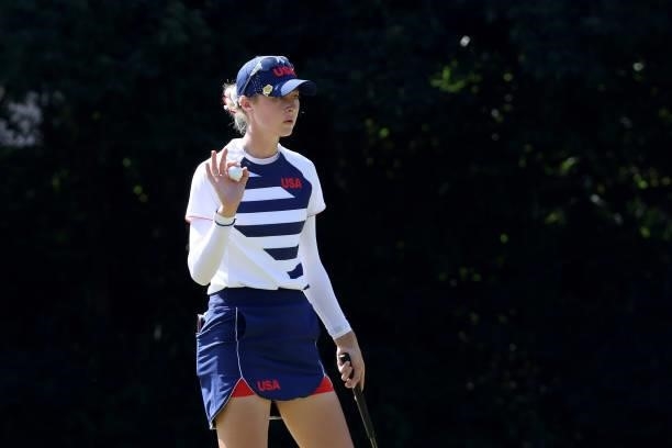 Nelly Korda of Team United States waves after putting on the 17th green during the second round of the Women's Individual Stroke Play on day thirteen...