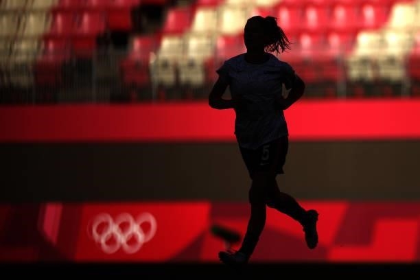 Silhouette of Kelley O'Hara of Team United States warming up prior to the Women's Bronze Medal match between United States and Australia on day...