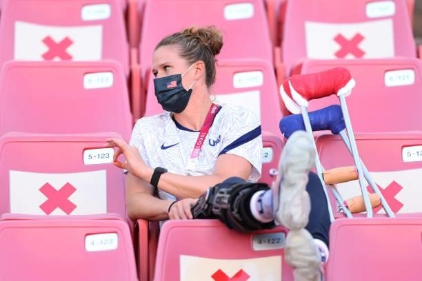 Alyssa Naeher of Team United States is seen in the stand with crutches following an injury picked up in the Semi-Final match prior to the Women's...