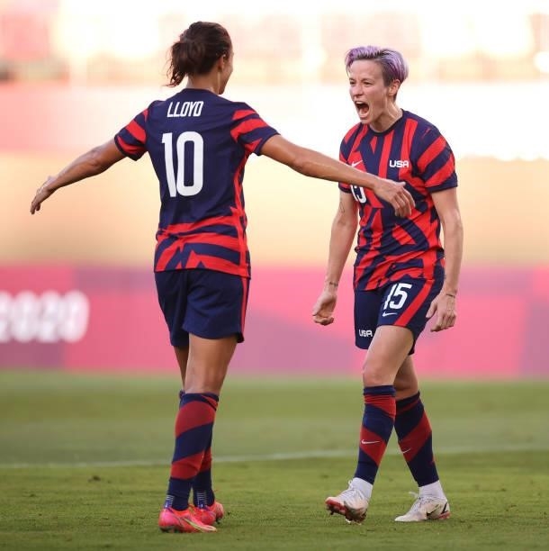 Megan Rapinoe of Team United States celebrates with teammate Carli Lloyd after scoring their side's second goal during the Women's Bronze Medal match...