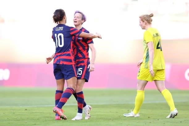 Megan Rapinoe of Team United States celebrates with Carli Lloyd after scoring their side's second goal during the Women's Bronze Medal match between...