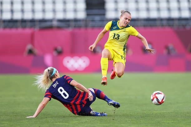 Tameka Yallop of Team Australia jumps over the challenge of Julie Ertz of Team United States during the Women's Bronze Medal match between United...