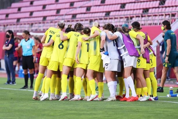 Players of Team Australia form a huddle prior to the Women's Bronze Medal match between United States and Australia on day thirteen of the Tokyo 2020...