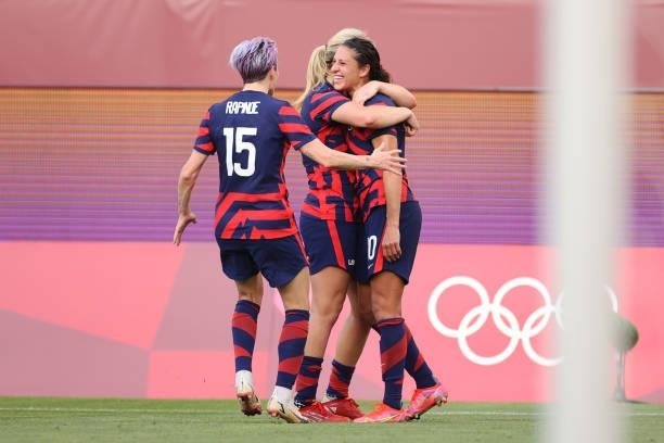 Carli Lloyd of Team United States celebrates with teammates after scoring their side's third goal during the Women's Bronze Medal match between...