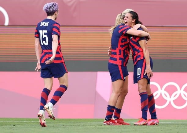 Carli Lloyd of Team United States celebrates with Lindsey Horan after scoring their side's third goal during the Women's Bronze Medal match between...