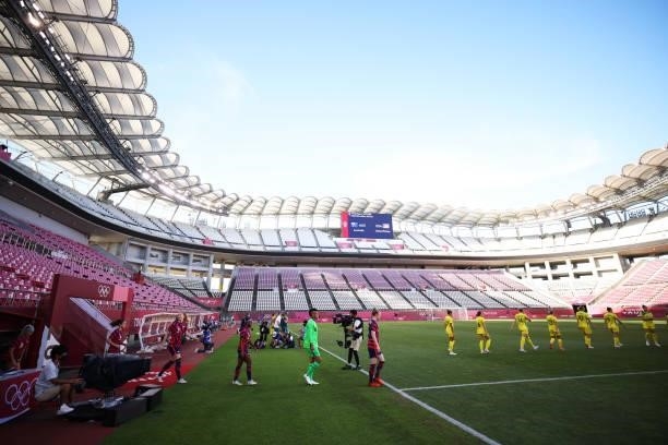 Both teams take to the field prior to the Women's Bronze Medal match between United States and Australia on day thirteen of the Tokyo 2020 Olympic...