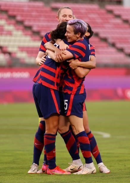 Carli Lloyd of Team United States celebrates with team mates after scoring their side's fourth goal during the Women's Bronze Medal match between...