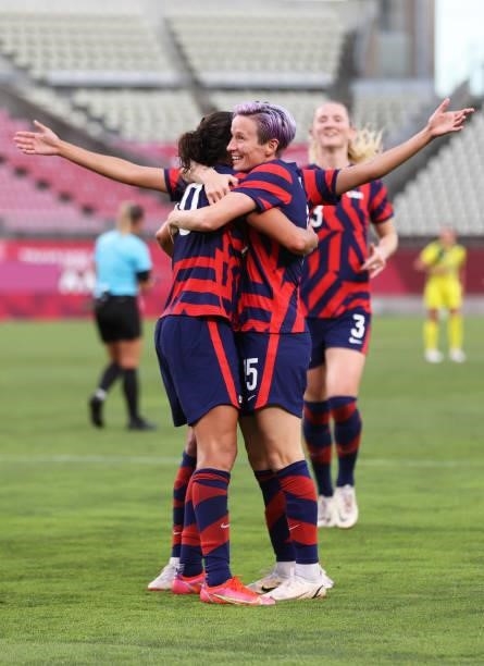 Carli Lloyd of Team United States celebrates with teammate Megan Rapinoe after scoring their side's fourth goal during the Women's Bronze Medal match...