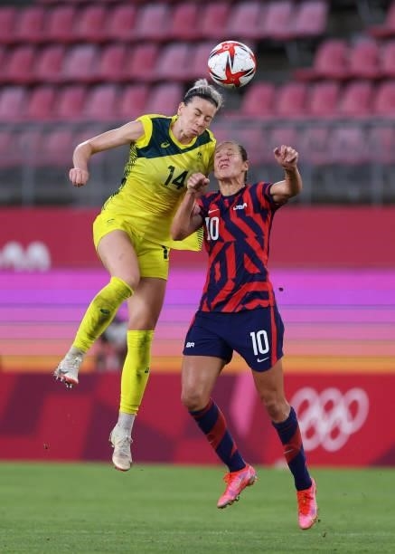 Alanna Kennedy of Team Australia competes for a header with Carli Lloyd of Team United States during the Women's Bronze Medal match between United...