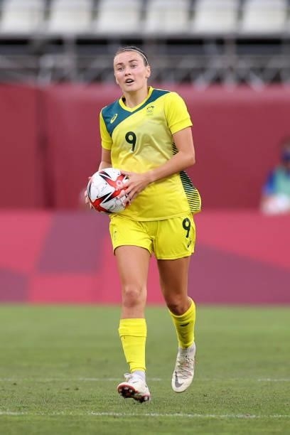 Caitlin Foord of Team Australia carries the ball back after scoring their side's second goal during the Women's Bronze Medal match between United...