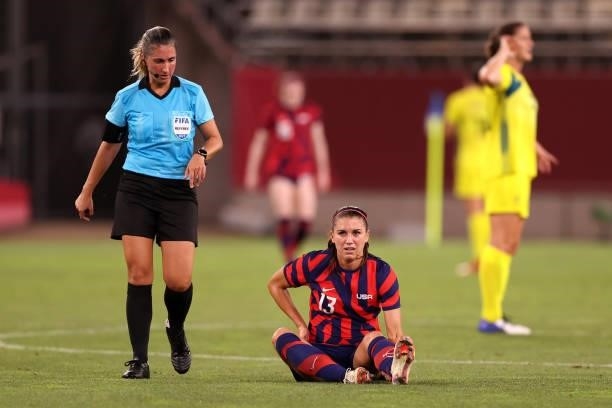 Alex Morgan of Team United States goes down injured during the Women's Bronze Medal match between United States and Australia on day thirteen of the...
