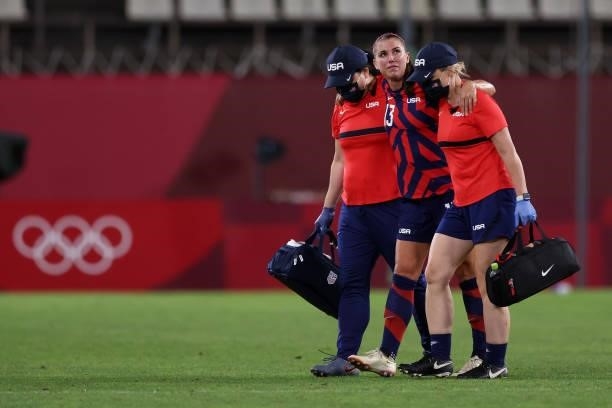 Alex Morgan of Team United States reacts as she leaves the pitch after picking up an injury during the Women's Bronze Medal match between United...