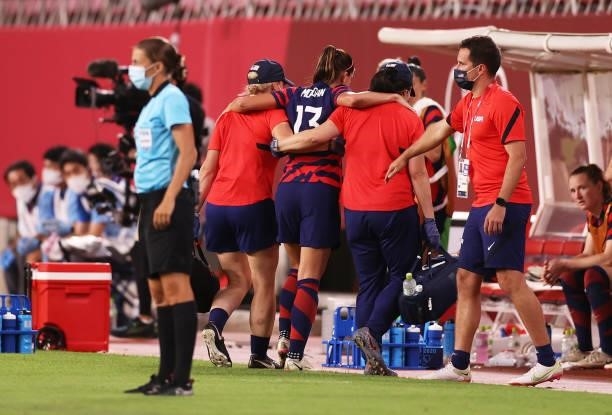 Alex Morgan of Team United States leaves the field after suffering an injury during the Women's Bronze Medal match between United States and...