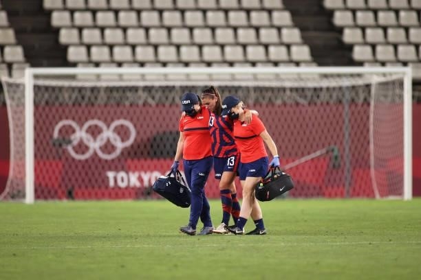 Alex Morgan of Team United States leaves the field after suffering an injury during the Women's Bronze Medal match between United States and...