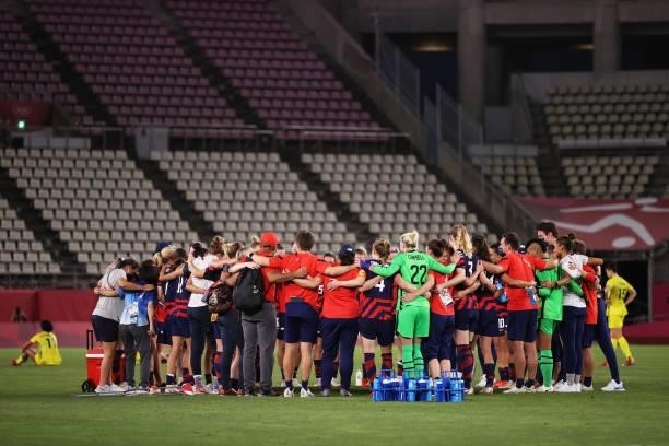 Players of Team United States form a huddle following victory in the Women's Bronze Medal match between United States and Australia on day thirteen...