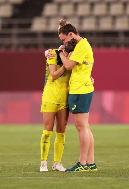Steph Catley of Team Australia is consoled following defeat in the Women's Bronze Medal match between United States and Australia on day thirteen of...