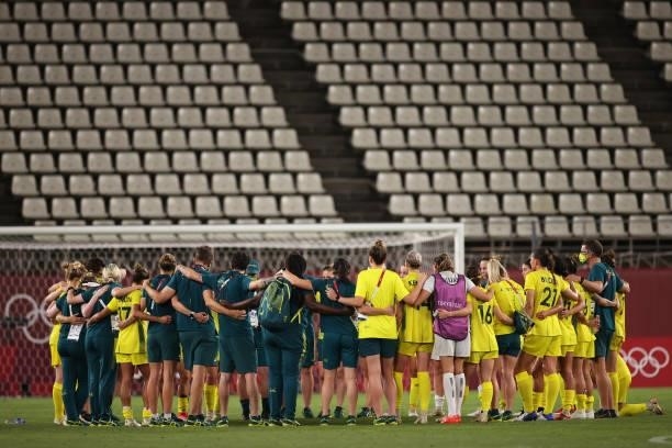 Players of Team Australia form a huddle following defeat in the Women's Bronze Medal match between United States and Australia on day thirteen of the...