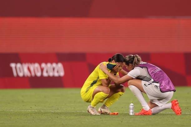 Sam Kerr of Team Australia is consoled by teammate Lydia Williams following defeat in the Women's Bronze Medal match between United States and...
