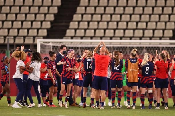Players of Team United States celebrate after victory in the Women's Bronze Medal match between United States and Australia on day thirteen of the...