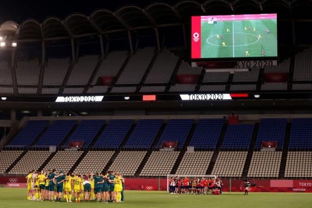 Both teams form huddle's following the Women's Bronze Medal match between United States and Australia on day thirteen of the Tokyo 2020 Olympic Games...