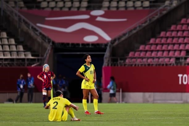 Players of Australia show their dejection after the Olympic football bronze medal match between United States and Australia at Kashima Stadium on...