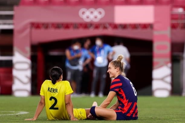 Kristie Mewis of United States embraces Sam Kerr of Australia after the Olympic football bronze medal match between United States and Australia at...