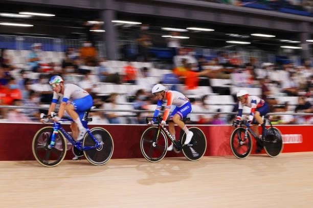 Elia Viviani of Team Italy, Benjamin Thomas of Team France and Matthew Walls of Team Great Britain sprint during the Men's Omnium points race, 4...