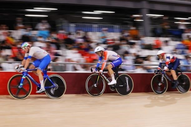 Elia Viviani of Team Italy, Benjamin Thomas of Team France and Matthew Walls of Team Great Britain sprint during the Men's Omnium points race, 4...