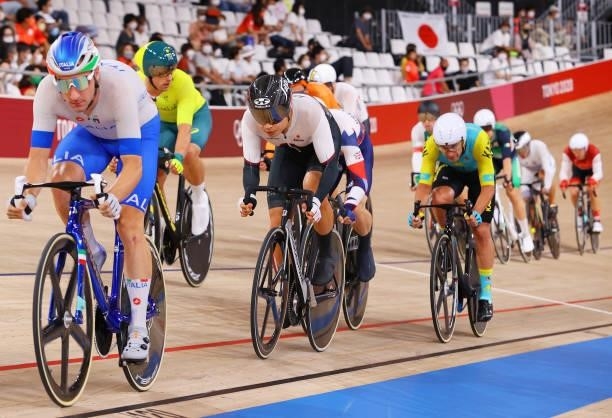 Eiya Hashimoto of Team Japan and Artyom Zakharov of Team Kazakhstan compete during the Men's Omnium points race, 4 round of 4 of the track cycling on...