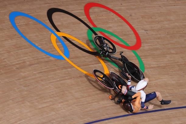 Laurine van Riessen of Team Netherlands and Katy Marchant of Team Great Britain fall during the Women's Keirin quarterfinals - heat 1 of the track...