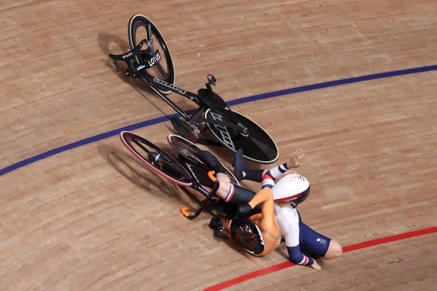 Laurine van Riessen of Team Netherlands and Katy Marchant of Team Great Britain fall during the Women's Keirin quarterfinals - heat 1 of the track...
