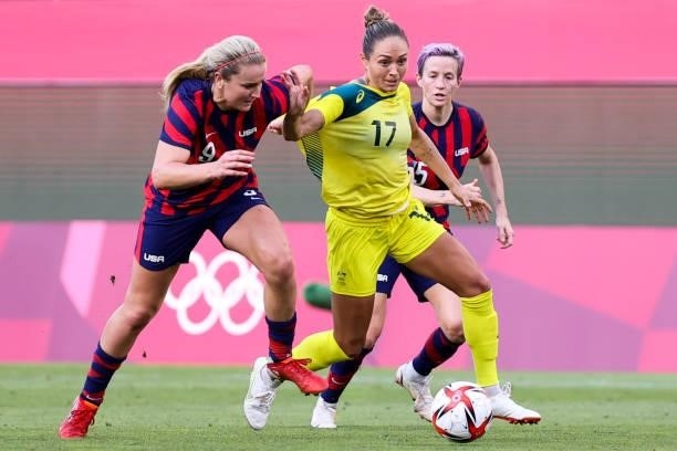Kyah Simon of Team Australia competes for the ball with Lindsey Horan of Team United States during the Olympic football bronze medal match between...