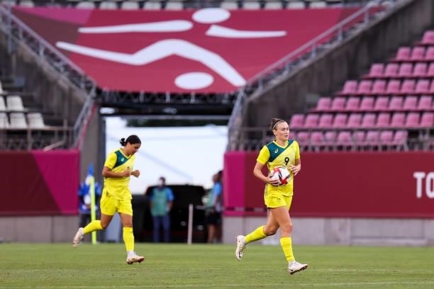 Sam Kerr of Team Australia scores a goal by head shoots during the Olympic football bronze medal match between United States and Australia at Kashima...