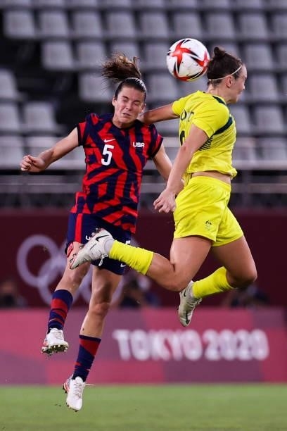 Kelley O'Hara of Team United States competes for the ball with Caitlin Foord of Team Australia during the Olympic football bronze medal match between...
