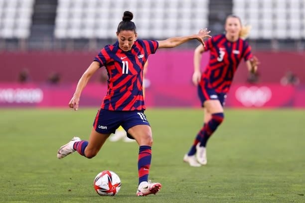 Christen Press of Team United States pass the ball during the Olympic football bronze medal match between United States and Australia at Kashima...