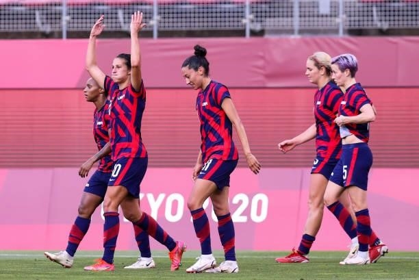 Carli Lloyd of Team United States celebrates her goal with teammates during the Olympic football bronze medal match between United States and...