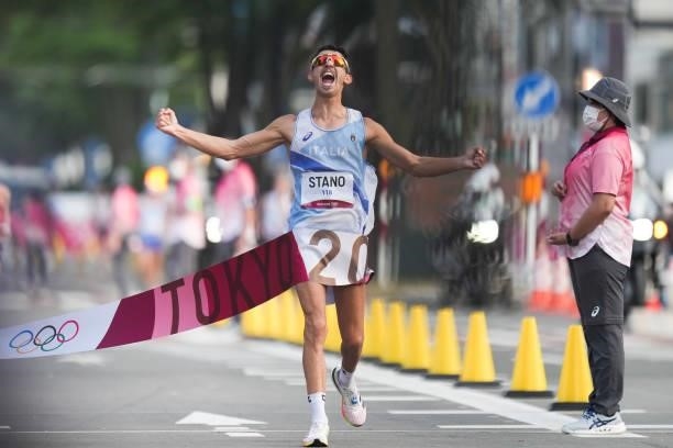 Massimo Stano of Team Italy celebrates as he wins the Men's 20km Race Walk on day thirteen of the Tokyo 2020 Olympic Games at Sapporo Odori Park on...