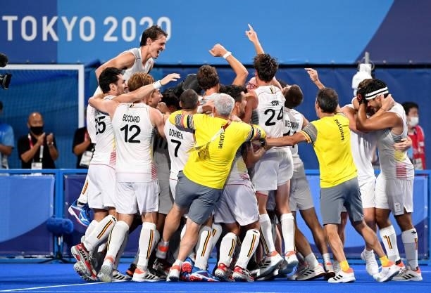 The Belgian players celebrate victory after the gold medal final match between Australia and Belgium on day thirteen of the Tokyo 2020 Olympic Games...