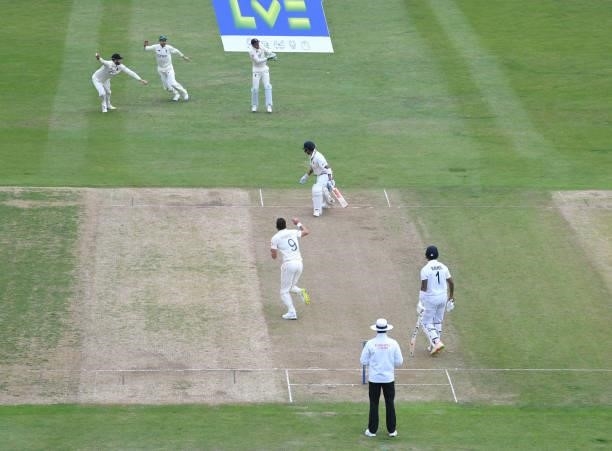 England bowler James Anderson takes the wicket of Virat Kohli first ball during day two of the First Test Match between England and India at Trent...