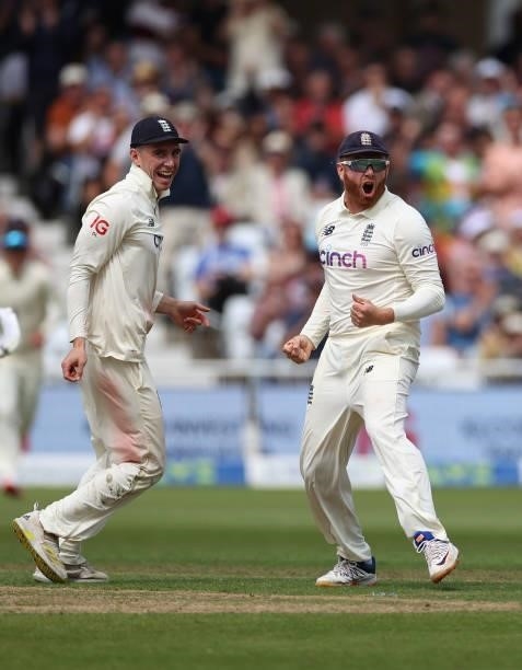 Jonny Bairstow of England celebrates with Dan Lawrence after running out Ajinkya Rahane of India during day two of the First LV= Insurance test match...