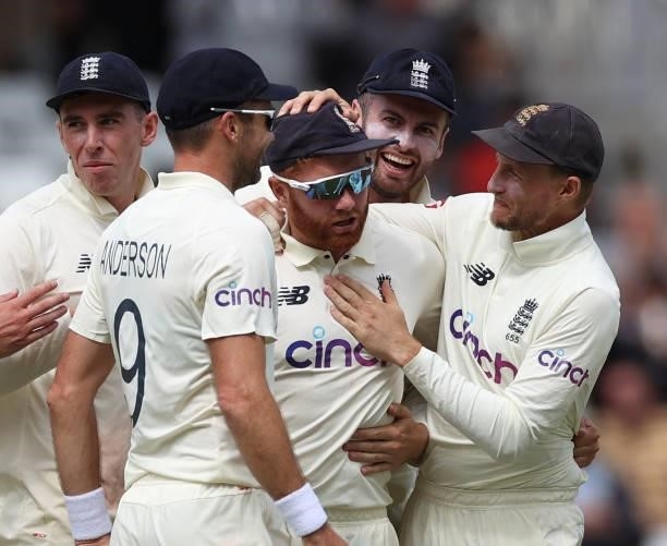 Jonny Bairstow of England celebrates with Joe Root after running out Ajinkya Rahane of India during day two of the First LV= Insurance test match...