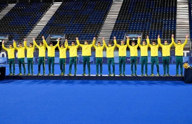 The Australian team take to the podium to receive their silver medal after the gold medal final match between Australia and Belgium on day thirteen...
