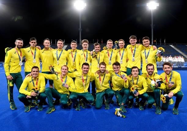 The Australian team poses for a photo after the gold medal final match between Australia and Belgium on day thirteen of the Tokyo 2020 Olympic Games...