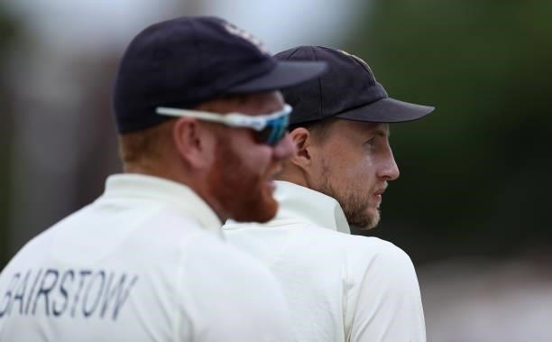 Jonny Bairstow of England and captain Joe Root during day two of the First LV= Insurance test match between England and India at Trent Bridge on...