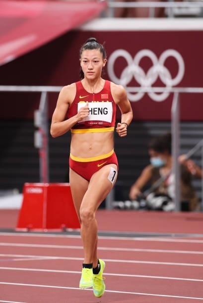 Zheng Ninali of Team China competes in the Women's Heptathlon 800m heats on day thirteen of the Tokyo 2020 Olympic Games at Olympic Stadium on August...