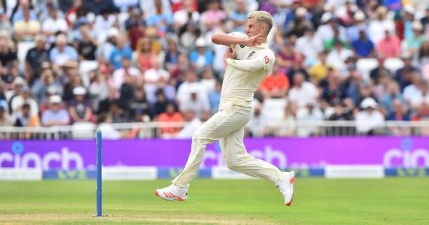 Sam Curran of England runs into bowl during day two of the First Test Match between England and India at Trent Bridge on August 05, 2021 in...
